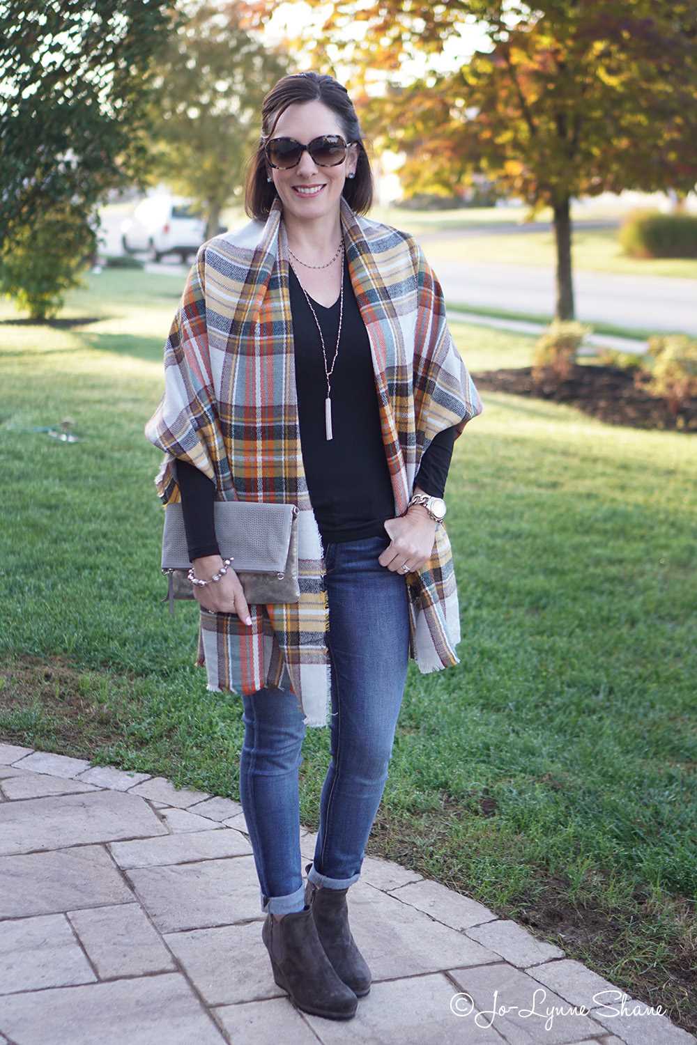 Incorporating Accessories to Elevate your Blanket Scarf Poncho Outfit
